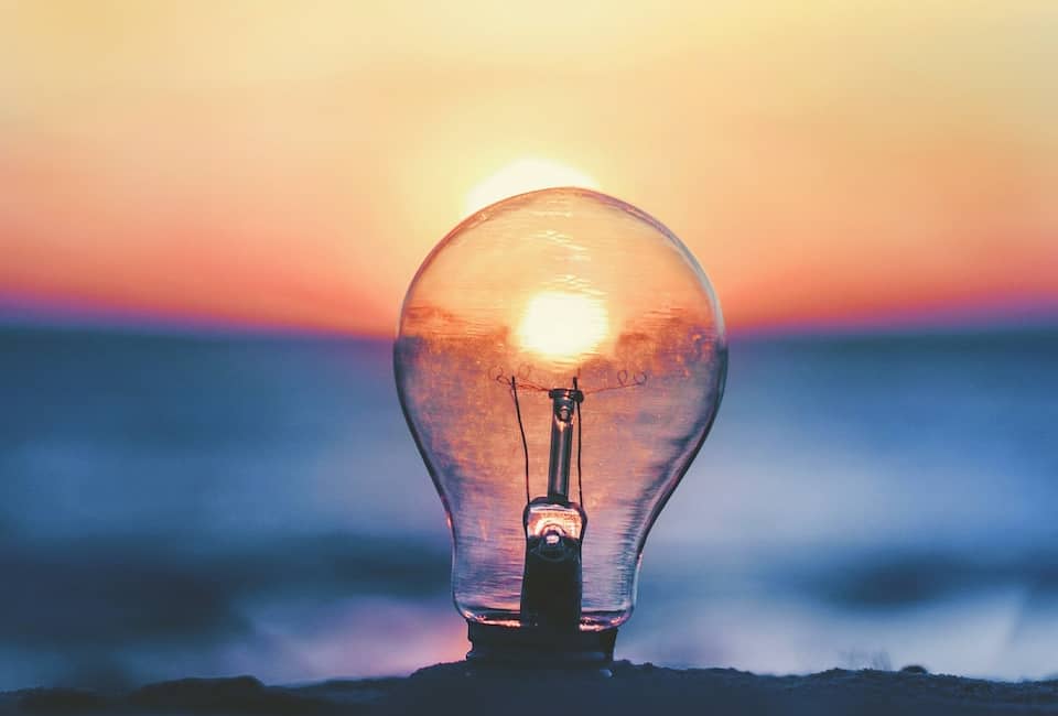 selective focus photography of light bulb